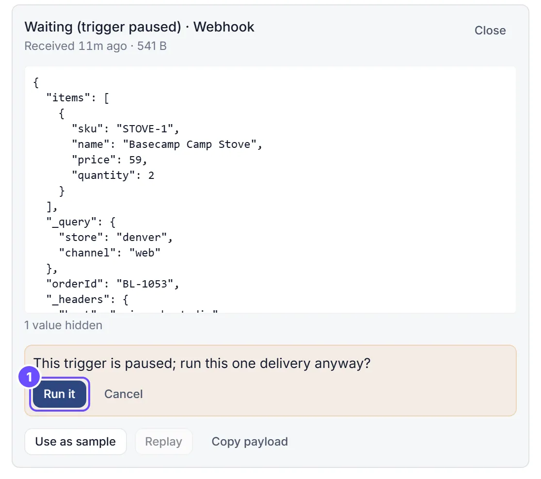 A waiting delivery with the replay confirmation open under its preview: This trigger is paused; run this one delivery anyway? Run it is marked, next to Cancel.